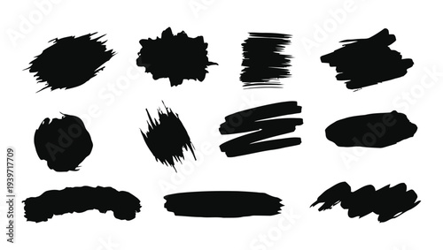 A collection of 12 unique black brush strokes on a white background for artistic and design purposes