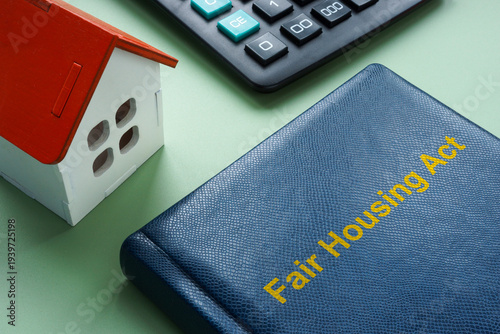 FHA Fair housing act with house model.