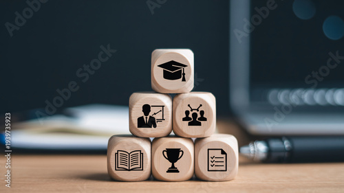 Wooden blocks with education and business icons for learning and success