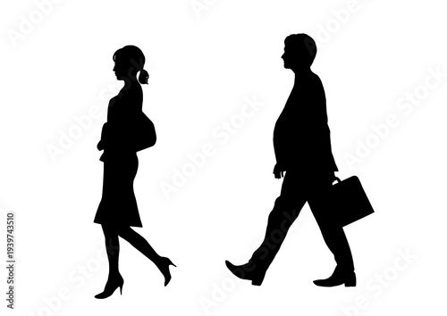 Fototapeta 歩く社会人男女横姿シルエット