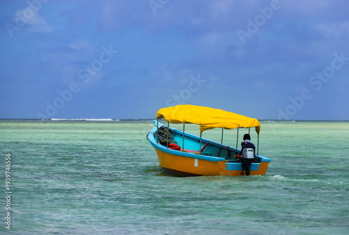Fishing boat on the Rodrigues Island Lagoon, Mauritius, Africa	