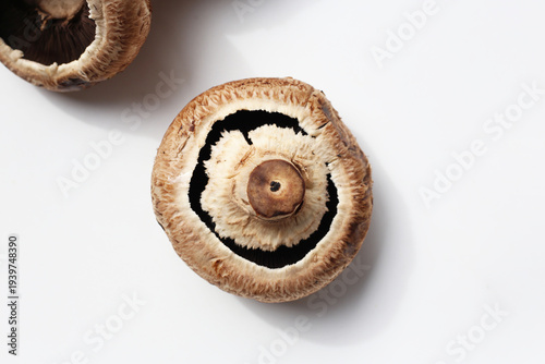 Tableau sur toile Fresh portobello mushrooms with visible gills underneath.