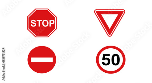 Traffic signs arranged in a grid, featuring stop, yield, no entry, and speed limit symbols on a plain background from a direct viewpoint.