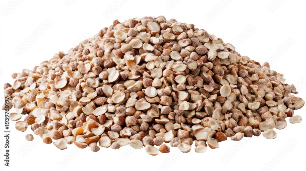 Fototapeta premium Chopped hazelnuts pile on white background