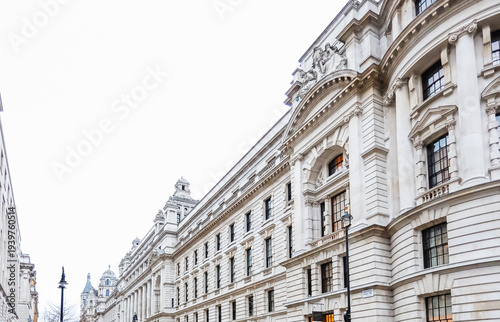Ornate historical government building facade on Whitehall street in London, United Kingdom under a bright sky