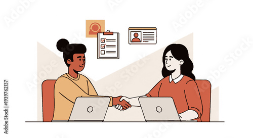 Two women shaking hands over laptops in office setting with documents