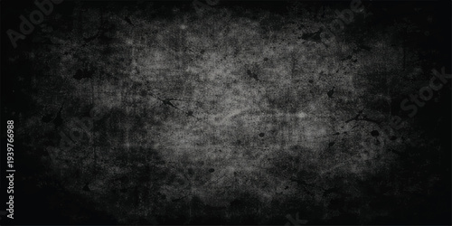 A dark and empty black and white grunge background featuring an old textured stone wall pattern with a rough vintage concrete surface and a dirty blank paper backdrop design