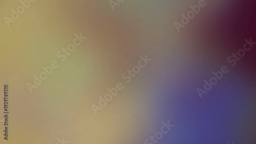 Dreamy abstract background with soft focus blurring warm and cool color gradients.