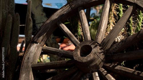 Rustic Wooden Wagon Wheel with Cactus in Old Town San Diego