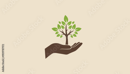 Hand nurturing a small tree symbolizing growth and sustainability