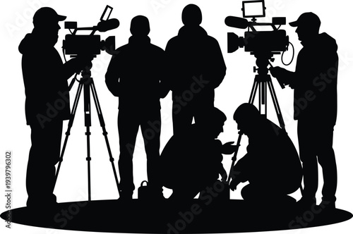Silhouette of a film crew with multiple camera operators and technicians
