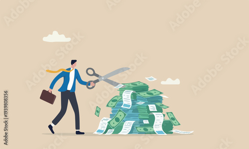 Cut bills reduce, tax or payment deduction, limit spending or control cash flow concept, businessman using big scissors to cut pile of bills and expense