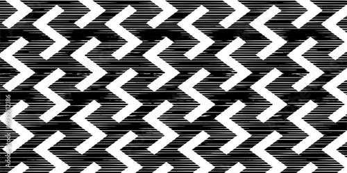 Seamless black and white checkered square tiles create a geometric vector texture for a seamless abstract background with arrows and a chessboard fabric pattern design