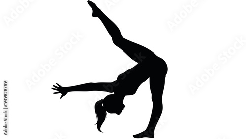 Woman performing dynamic yoga pose with one leg raised high