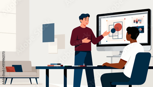 Two professionals collaborate near a large screen. One gestures toward data visuals on the display. The other sits, focused on the content. Modern office space features clean lines and minimal decor