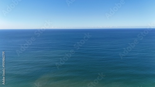 Drone shot aerial view of the ocean in Australia during Summer 