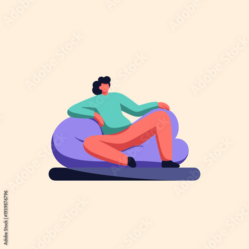 Relaxed young woman lounging on large purple bean bag chair in casual outfit