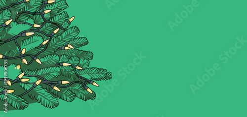 A Christmas tree with yellow lights is placed against a green background. The scene shows a festive setup for the holiday.