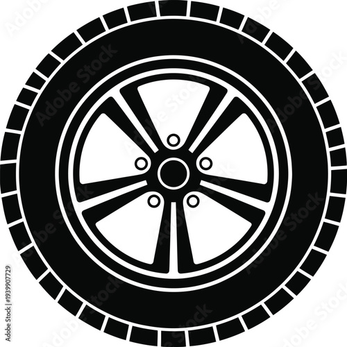 Black and white of a car wheel with tread pattern tire