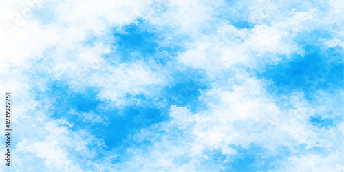 Abstract, a sky dominated by a blue backdrop is filled with soft, fluffy clouds, creating a sense of serenity and vastness.