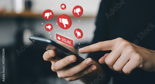 Hands holding smartphone with red dislike thumbs down floating above