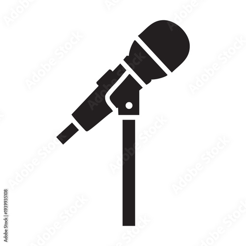 A microphone on a stand is shown in black and white