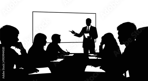 Businessman presenting to colleagues in modern meeting room