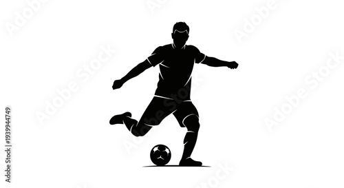 Dynamic soccer player kicking ball with intensity