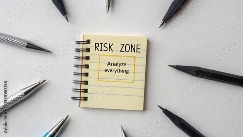 Risk Zone Note with Pens for Analysis and Evaluation of Ideas and Strategies in Business and Project Management