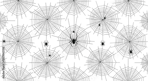 Spooky halloween seamless pattern features many black spiders hanging from their intricate webs on a white background.