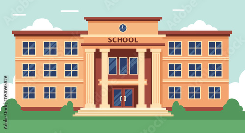 Large multi story school building with classic architecture and large windows set against a clear blue sky and green grass field.