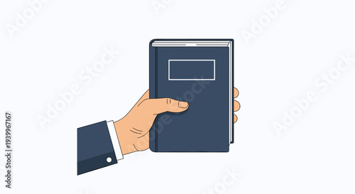 Close up of a human hand holding a classic dark blue hardcover book isolated on a clean white background for study concepts.