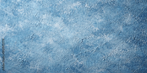 Blue water surface texture with frozen ice patterns and cold winter frost creates a crystal nature backdrop for a seasonal blue wallpaper design