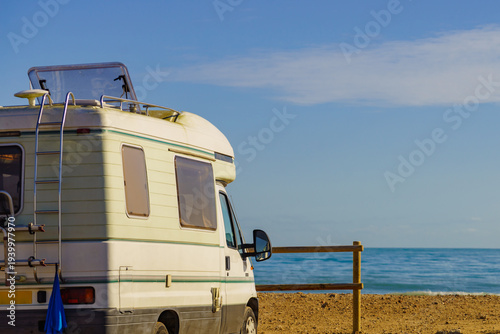 Caravan with open sunroof, raisable window on roof top