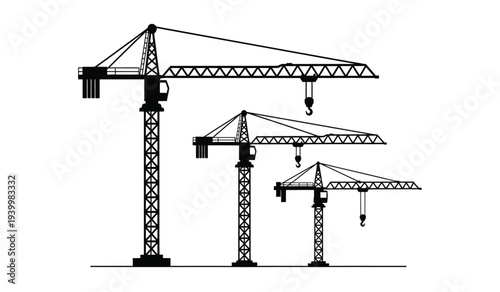 Three construction cranes of varying sizes standing in a row