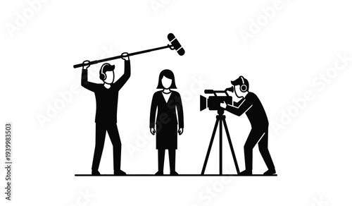 Silhouette of film crew filming a scene with a clapperboard and camera