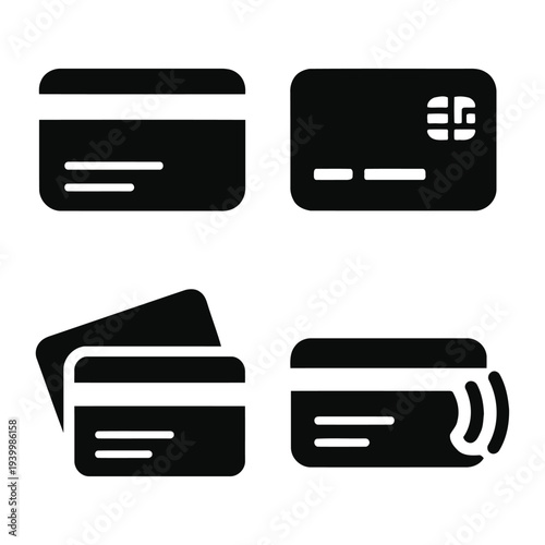 Set of four black credit card icons with various designs on a white background, viewed from directly above.