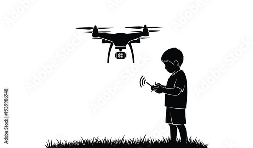 Young boy controlling a drone with a remote on a grassy field