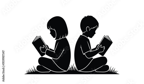 Silhouette of two children sitting back to back reading books on grass