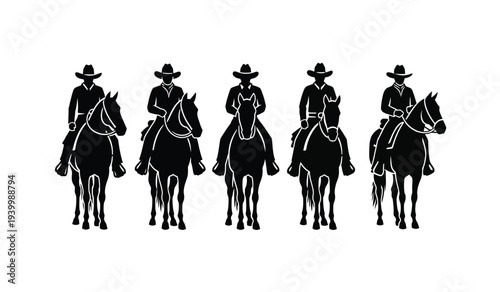 Group of cowboys riding horses in silhouette