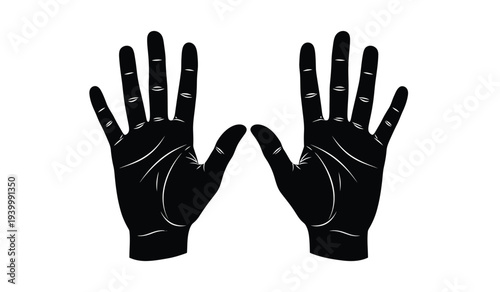 A pair of black gloves with fingers spread apart on a white background