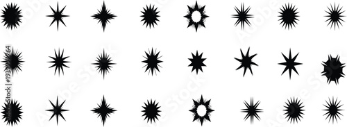 Collection of abstract black inkblot patterns on a white background