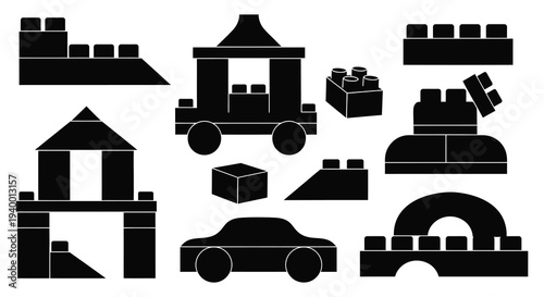 A collection of building blocks arranged into various shapes including vehicles and structures in silhouette high quality professional