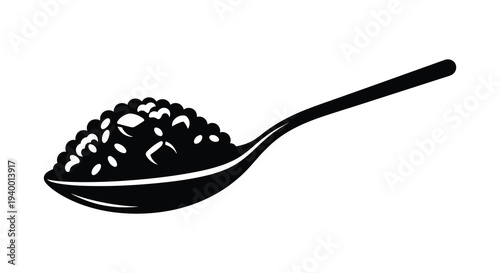 A black silhouette depicts a spoonful of grainy substance possibly seeds or rice displayed on white background silhouette