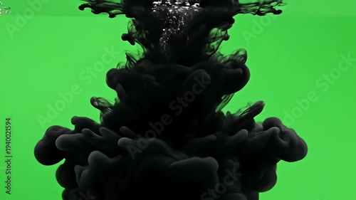 Abstract Ink Diffusion with cloud of black paint mixing into water over green screen slowly filling the view distortion, overlay, glitch, static noise, scan lines on background, 4k animated video loop