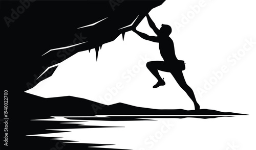 Silhouette of climber scaling rock face near water