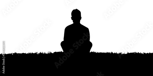 Man Meditating Sitting on Grass Silhouette
