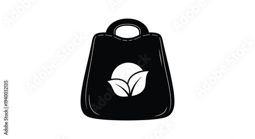 A striking black silhouette of a tote bag with a leaf design showcasing a modern aesthetic silhouette