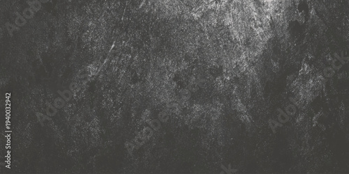 A grayscale abstract wall texture displaying a weathered mottled surface with varying shades of gray and white tones