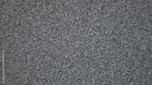 Close-up of dark gray sand texture, abstract background, macro shot, granular surface